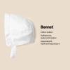 imageAmazon Essentials x Sofia Grainge Baby Girls Eyelet Bonnet HatWhite