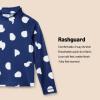 imageAmazon Essentials Girls and Toddlers Long Sleeve Rashguard TShirtDeep Blue Ivory Abstract Dots
