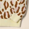 imageAmazon Essentials Girls and Toddlers Pullover Crewneck SweaterIvory Leopard