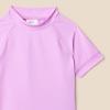 imageAmazon Essentials Girls and Toddlers Short Sleeve Rashguard TShirtBright Lavender