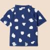 imageAmazon Essentials Girls and Toddlers Short Sleeve Rashguard TShirtDeep Blue Ivory Abstract Dots