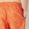 imageAmazon Essentials Mens 9quot Swim Trunks with Mesh Lining Pockets Drawstring ClosureCaramel Coral Tropical Leaves