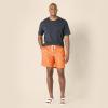 imageAmazon Essentials Mens 9quot Swim Trunks with Mesh Lining Pockets Drawstring ClosureCaramel Coral Tropical Leaves