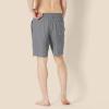 imageAmazon Essentials Mens 9quot Swim Trunks with Mesh Lining Pockets Drawstring ClosureCharcoal