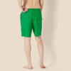 imageAmazon Essentials Mens 9quot Swim Trunks with Mesh Lining Pockets Drawstring ClosureDark Green