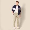 imageAmazon Essentials Mens SlimFit WrinkleResistant FlatFront Stretch Chino PantTan