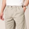 imageAmazon Essentials Mens ClassicFit WrinkleResistant Pleated Chino Pant Available in Big ampamp TallKhaki Beige