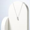 imageAmazon Essentials Plated Sterling Silver Cubic Zirconia Round Cut Solitaire Pendant Necklace 18quot previously Amazon CollectionPlatinum