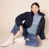 imageAmazon Essentials Womens ClassicFit Lightweight LongSleeve Turtleneck Sweater Available in Plus SizeIndigo Blue Heather