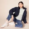 imageAmazon Essentials Womens ClassicFit Lightweight LongSleeve Turtleneck Sweater Available in Plus SizeIvory