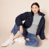 imageAmazon Essentials Womens ClassicFit Lightweight LongSleeve Turtleneck Sweater Available in Plus SizeLight Grey Heather