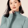imageAmazon Essentials Womens ClassicFit Lightweight LongSleeve Turtleneck Sweater Available in Plus SizeSage Green Heather