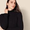 imageAmazon Essentials Womens Fisherman Cable Turtleneck Sweater Available in Plus SizeBlack