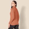 imageAmazon Essentials Womens Fisherman Cable Turtleneck Sweater Available in Plus SizeCaramel