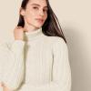imageAmazon Essentials Womens Fisherman Cable Turtleneck Sweater Available in Plus SizeCream