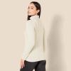 imageAmazon Essentials Womens Fisherman Cable Turtleneck Sweater Available in Plus SizeCream