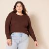 imageAmazon Essentials Womens Lightweight LongSleeve Cable Crewneck Sweater Available in Plus SizeLight Pink