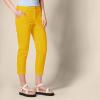 imageAmazon Essentials Womens MidRise SlimFit Stretchy Cropped Tapered Leg Khaki Dress Pants Available in Plus SizeDark Yellow
