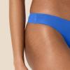 imageAmazon Essentials Womens Seamless Breathable Underwear for Women Thong Bonded Stretch Pack of 4Pale Blue