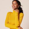 imageAmazon Essentials Womens SlimFit Lightweight LongSleeve Turtleneck SweaterGold