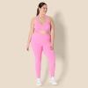 imageAmazon Essentials Womens Active FormFlex Buttery Soft Light Support Halter VNeck Sports BraPink