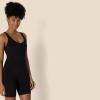 imageAmazon Essentials Womens Active Formflex Buttery Soft One Piece Shorts Romper Jumpsuit with BuiltIn BraBlack
