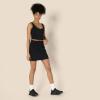 imageAmazon Essentials Womens Active Formflex Buttery Soft Tennis Skirt with Builtin Shorts with PocketsBlack