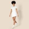 imageAmazon Essentials Womens Active Formflex Buttery Soft Tennis Skirt with Builtin Shorts with PocketsWhite
