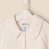 imageAmazon Essentials x Sofia Grainge Unisex Toddlers and Babies Peter Pan Collar Sweater JacketIvory