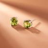 imageAmazon Essentials Sterling Silver Round Birthstone Stud Earrings previously Amazon CollectionGreen Peridot  August
