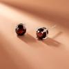imageAmazon Essentials Sterling Silver Round Birthstone Stud Earrings previously Amazon CollectionRed Garnet  January