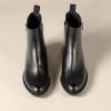 imageAmazon Essentials Womens Exterior Zip Flat Ankle BootBlack Faux Leather