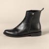 imageAmazon Essentials Womens Exterior Zip Flat Ankle BootBlack Faux Leather