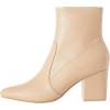 imageAmazon Essentials Womens Fitted Stretch Heel BootBeige Faux Leather