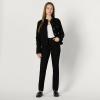 imageAmazon Essentials Womens RegularFit Low Stretch Denim ButtonFront Trucker JacketBlack