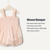 imageAmazon Essentials x Sofia Grainge Baby Girls Woven Sleeveless RomperPeach Classic Stripe