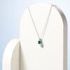 imageAmazon Essentials Sterling Silver Round Cut Birthstone Pendant Necklace 18quotCreated Emerald  May
