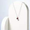 imageAmazon Essentials Sterling Silver Round Cut Birthstone Pendant Necklace 18quotRed Garnet  January