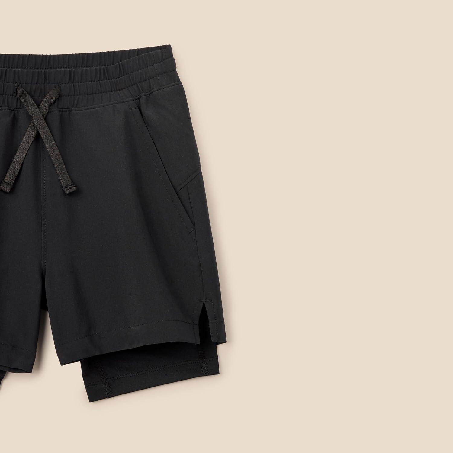 imageAmazon Essentials Boys Active Performance Stretch Woven Athletic Training Shorts with LinerBlack