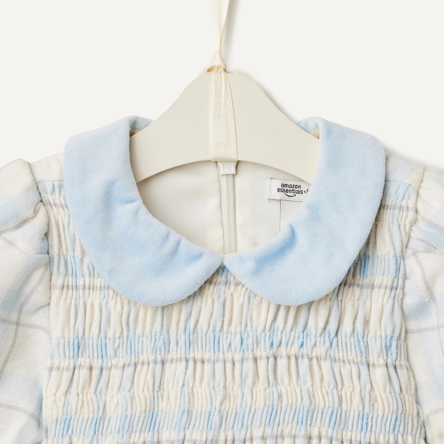 imageAmazon Essentials x Sofia Grainge Toddlers and Baby Girls Long Sleeve Flannel DressIvory Light Blue Simple Plaid