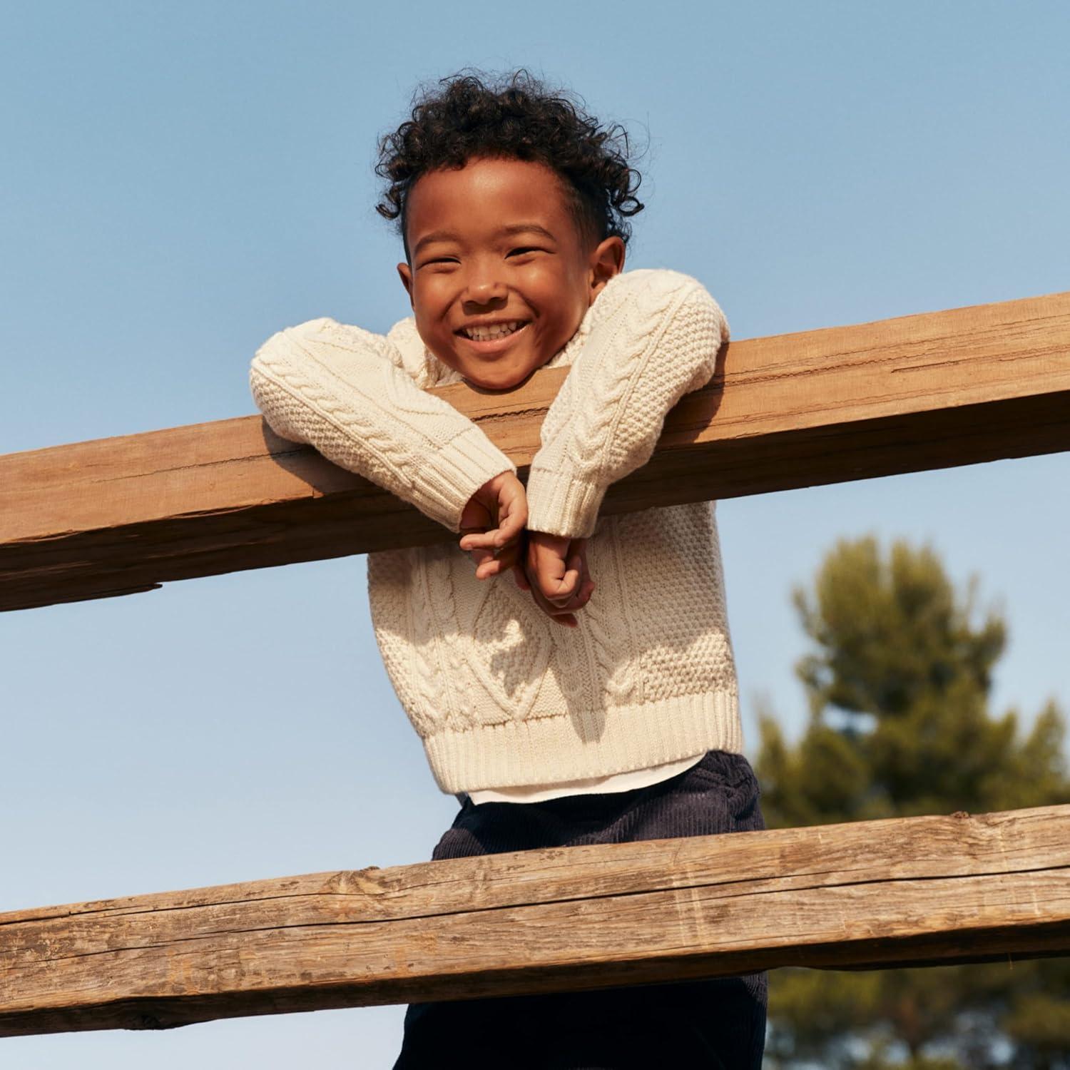 imageAmazon Essentials x Sofia Grainge Unisex Babies Toddlers and Kids Cable Crewneck SweaterNavy