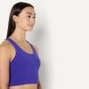 imageAmazon Essentials Womens Active Total Train Medium Support Gym Workout Racerback Crop Tank with BuiltIn BraRoyal Blue