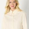 imageAmazon Essentials Demis Pick Womens Modern OversizedFit Cropped Cotton Stretch Poplin ButtonDown ShirtCream