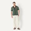 imageAmazon Essentials Mens RelaxedFit Short Sleeve ButtonDown Resort Knit Button Down ShirtDark Green Stripe Knit