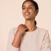 imageAmazon Essentials Womens Fleece Crewneck Long Sleeve Pullover Sweatshirt Available in Plus SizeLight Pink