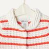 imageAmazon Essentials x Sofia Grainge Toddlers and Baby Girls Cotton Short Sleeve Button Front Sweater with Peter Pan CollarIvory Red Uneven Stripe