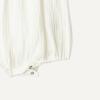 imageAmazon Essentials x Sofia Grainge Baby Girls Cotton Gauze Sleeveless RomperIvory