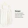 imageAmazon Essentials x Sofia Grainge Baby Girls Cotton Gauze Sleeveless RomperIvory