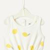 imageAmazon Essentials x Sofia Grainge Baby Girls Lightweight French Terry Sleeveless Shorts RomperIvory Big Lemon