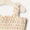 imageAmazon Essentials x Sofia Grainge Baby Girls Woven Sleeveless Ruffle RomperBright Pink Little Strawberries